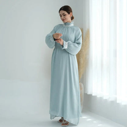Robe Abaya brillante et lumineuse pour femmes musulmanes